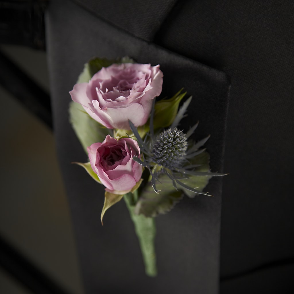 Veronica Boutonniere – Nacogdoches Floral Company, Nacogdoches TX