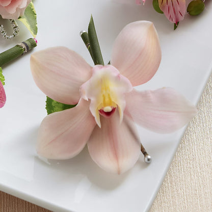Pink Cymbidium Boutonniere –  Nacogdoches Floral Company, Nacogdoches TX